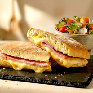Rockford Ham and Cheese Paninis with a garden salad in the background