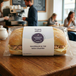 Tuna Melt in wrapped in packaging on a cafe counter